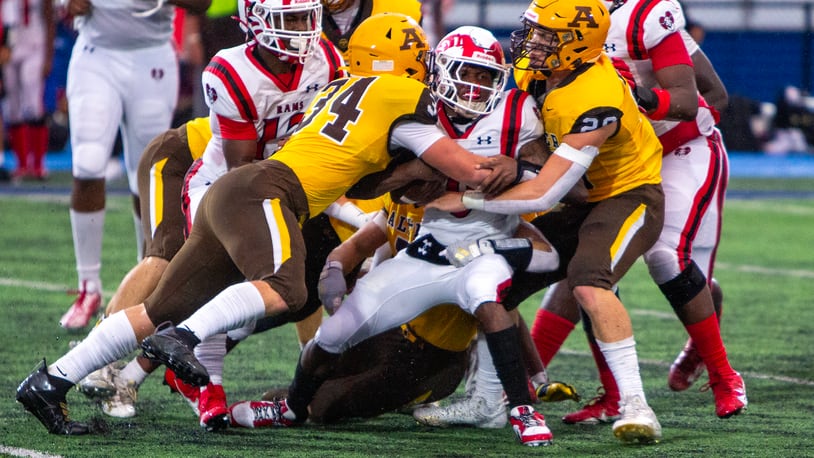 Alter and Trotwood-Madison, shown during last season's game in Xenia, figure to be two of the top teams in the area this season. Jeff Gilbert/CONTRIBUTED