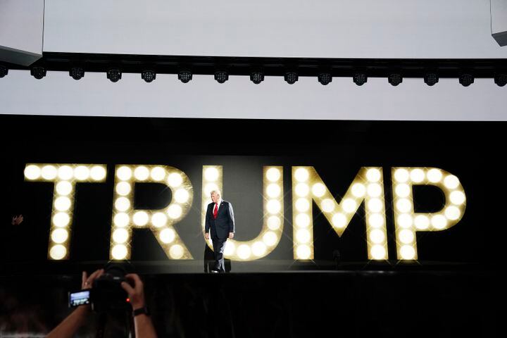 
                        Former President Donald Trump, the Republican presidential nominee, takes the stage to speak on the fourth and final night of the Republican National Convention at the Fiserv Forum in Milwaukee, on Thursday, July 18, 2024. (Haiyun Jiang/The New York Times)
                      