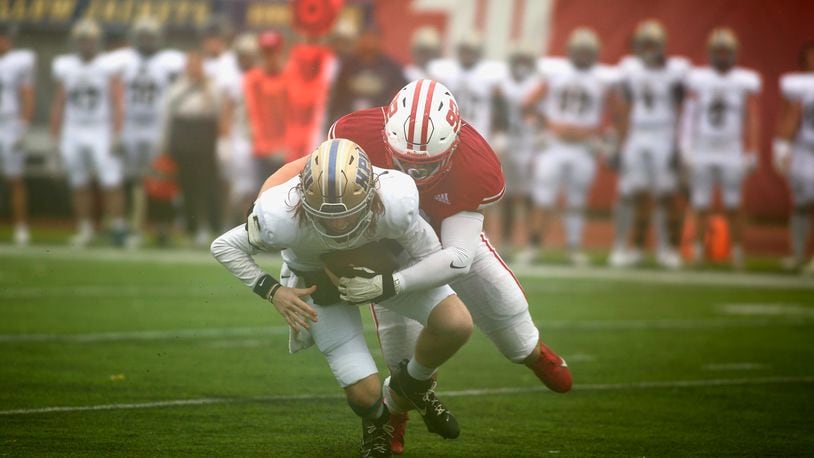 Wittenberg's Dalton Allen sacks Howard Payne's Zy Gravitt in the first quarter on Saturday, Sept. 28, 2024, at Edwards Maurer Field in Springfield. David Jablonski/Staff