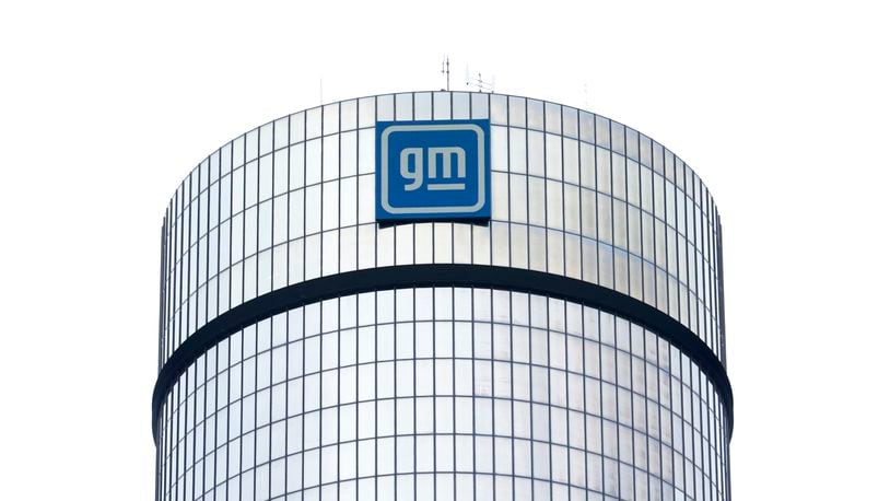 FILE - A General Motors logo is seen on a building, April 24, 2024, in Detroit. GM will pay nearly $146 million in penalties to the federal government because 5.9 million of its older vehicles don’t comply with emissions and fuel economy standards. (AP Photo/Paul Sancya, File)