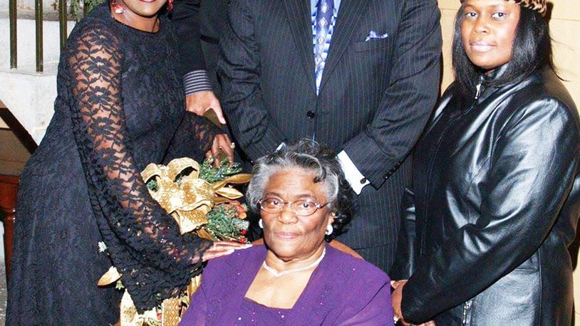 Otis, Ralph, Frank and Arthur are shown in this family photo; Doris is pictured to the left of their mother; Diane is on the right. Contributed photo