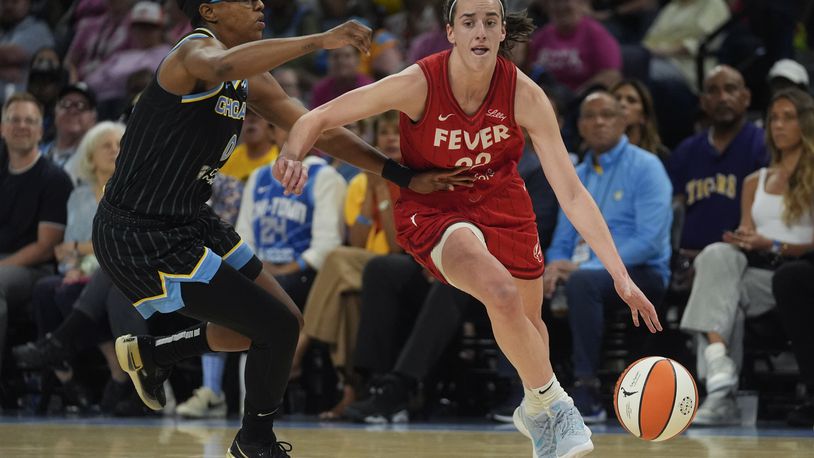 Chicago Sky guard Diamond DeShields, left, guards Indiana Fever guard Caitlin Clark, right, during the second half of a WNBA basketball game Friday, Aug. 30, 2024, in Chicago. (AP Photo/Erin Hooley)