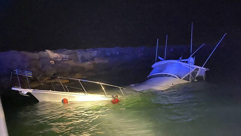 This photo provided by the Long Beach, Calif., Fire Department shows a power boat that crashed into a jetty in Southern California on Wednesday, July 3, 2024, killing one man and injuring 10 other people, officials said. (Long Beach Fire Department via AP)