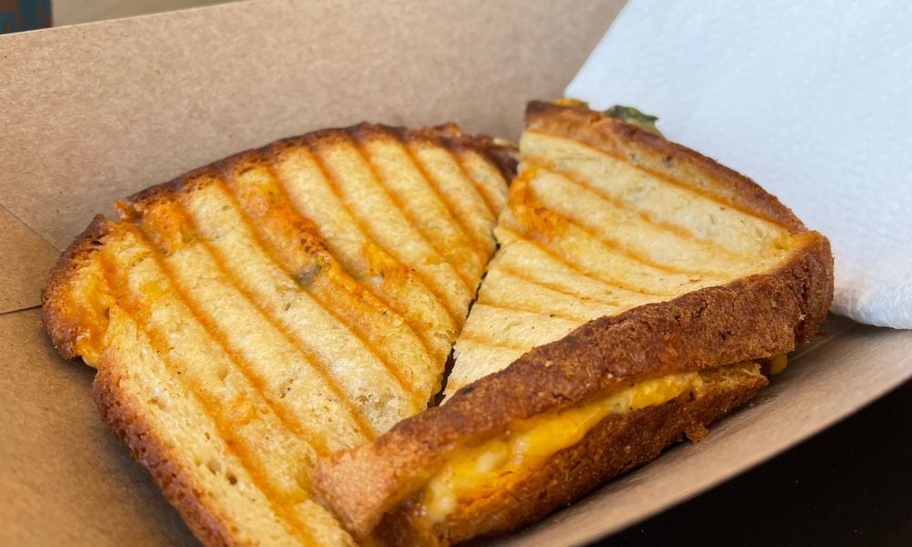 Socialite Cafe, a European-style cafe in Kettering, is open at 4011 Marshall Road. Pictured is The Jackie O' Cali Grilled Cheese. NATALIE JONES/STAFF