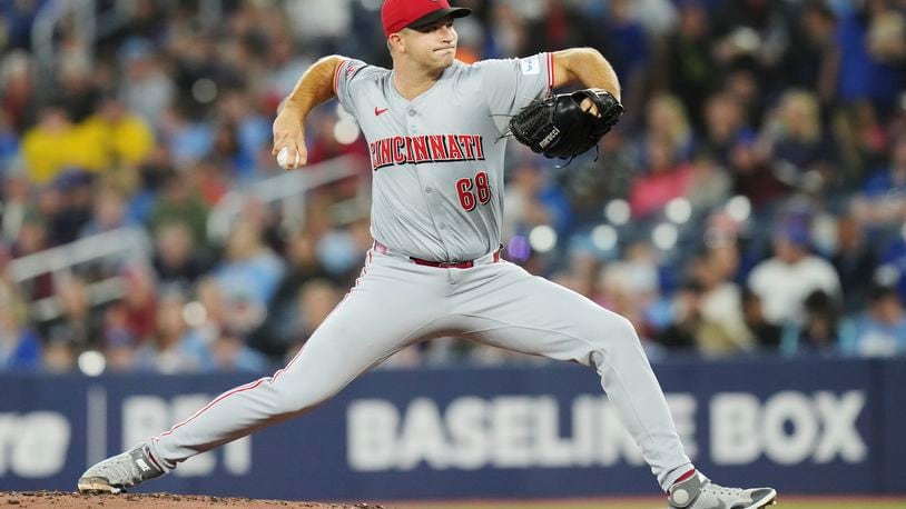 Cincinnati Reds pitcher Carson Spiers (68) works against the Toronto Blue Jays during the first inning of a baseball game in Toronto, Tuesday, Aug. 20, 2024. (Chris Young/The Canadian Press via AP)