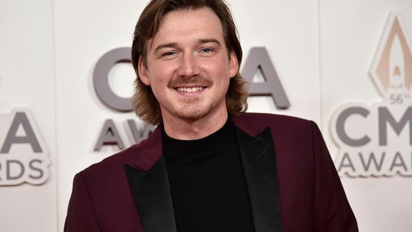 FILE - Morgan Wallen arrives at the 56th annual CMA Awards, Nov. 9, 2022, in Nashville, Tenn. On Tuesday, May 21, 2024, Nashville councilmembers rejected plans for a glowing sign at Wallen's new bar along the city's neon-lit strip of honky tonks, citing his use of a racial slur publicized in 2021 and his recent criminal charges of throwing a chair off a rooftop and nearly hitting two police officers. (Photo by Evan Agostini/Invision/AP, File)