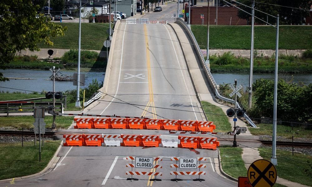 The Linden Avenue bridge is still closed Monday, Aug. 19, 2024, after a police chase and a crash into a train on Friday. It appears the railroad gate was damaged in the crash. City officials said the bridge would be closed until further notice. JIM NOELKER/STAFF