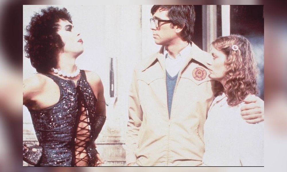 Left to right: Tim Curry (Dr. Frank-N-Furter), Barry Bostwick (Brad Majors) and Susan Sarandon (Janet Weiss) in “The Rocky Horror Picture Show.” FILE PHOTO