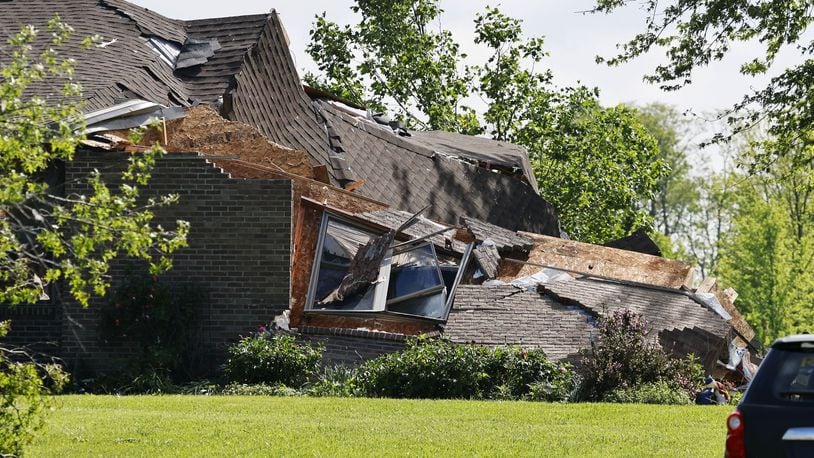 Damage from a suspected tornado from Tuesday, May 7, 2024, is shown in these images from Wednesday morning along Bunker Hill Woods Road in Reily Twp. in Butler County. NICK GRAHAM/STAFF