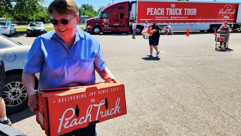 Nashville’s Peach Truck has kicked off its summer tour with several stops scheduled right here in the Miami Valley. PHOTO BY NICK GRAHAM/STAFF