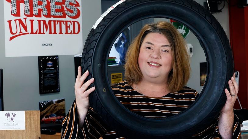 Courtney Carlisle, owner of Moraine's Tires Unlimited located at 3578 Kettering Blvd. in Moraine. MARSHALL GORBY/STAFF