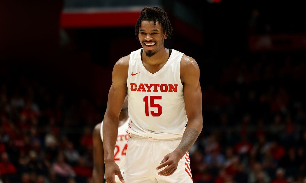 Dayton's DaRon Holmes II smiles as he prepares to shoot a free throw against Capital in an exhibition game on Saturday, Oct. 29, 2022, at UD Arena. David Jablonski/Staff
