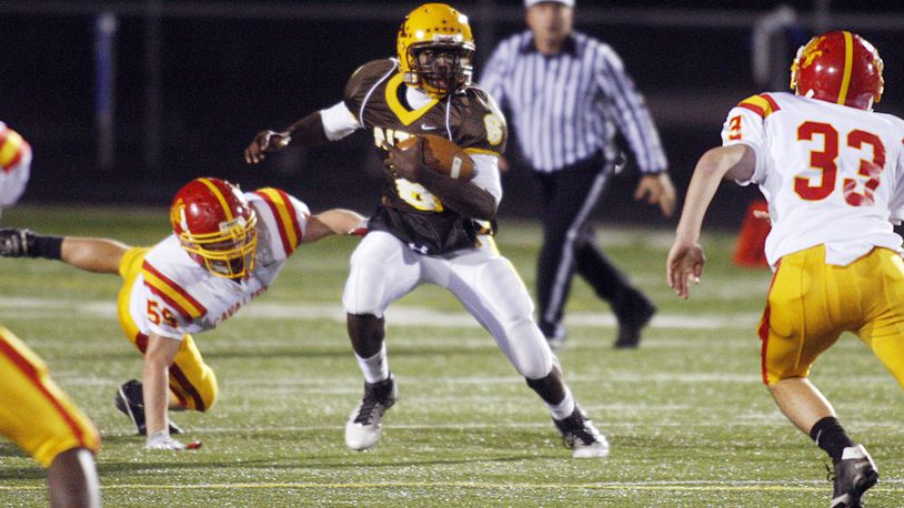 Alter's Malik Zaire gains yards on Purcell Marian at Springboro High School on Thursday, Sept. 15.