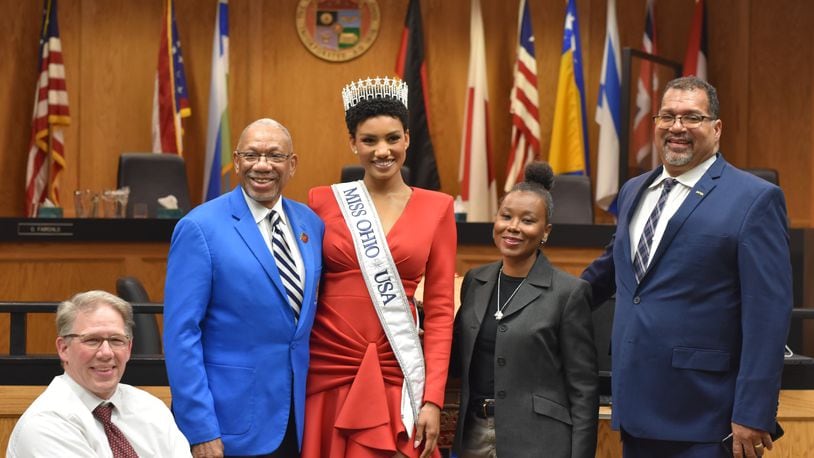 Macy Hudson, a 2017 Stivers School for the Arts graduate, was crowned Miss Ohio in May. She will compete at the 73rd Miss USA Pageant in August. Hudson visited Dayton City Hall on June 26, 2024, where she met with Mayor Jeffrey Mims Jr. and Commissioners Darryl Fairchild, Shenise Turner-Sloss and Chris Shaw. CORNELIUS FROLIK / STAFF
