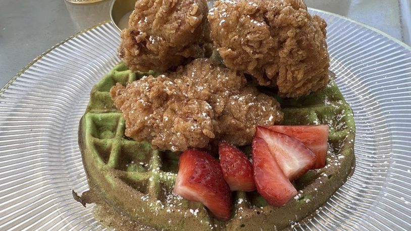 An order of "Resting Brunch Face," fried chicken on a pandan waffle with Vietnamese iced coffee syrup, is served at Breaking Dawn restaurant in Los Gatos, Calif., on Sunday, Aug. 4, 2024. (AP Photo/Terry Tang)