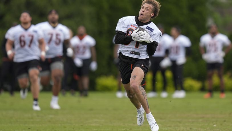 Cincinnati Bengals wide receiver Jermaine Burton catches a pass during the NFL football team's practice on Tuesday, May 14, 2024, in Cincinnati. (AP Photo/Carolyn Kaster)