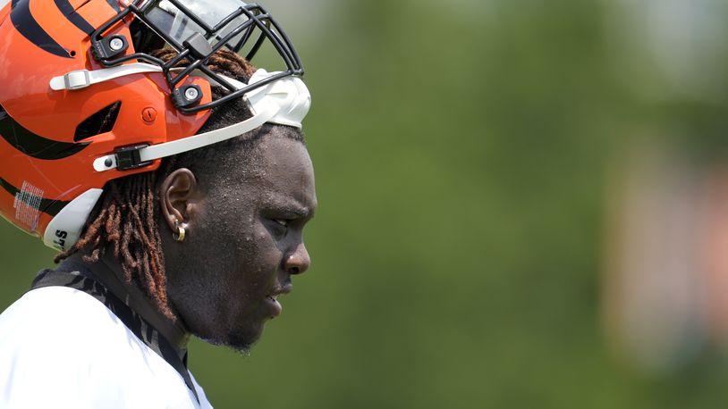 Cincinnati Bengals' Amarius Mims walks off of the field during NFL football practice, Tuesday, June 4, 2024, in Cincinnati. (AP Photo/Jeff Dean)