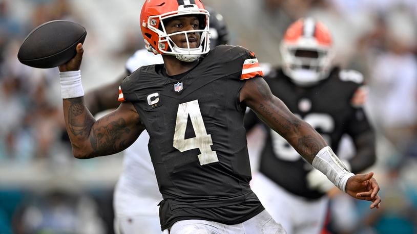 Cleveland Browns quarterback Deshaun Watson (4) looks for an open receiver during the second half of an NFL football game against the Jacksonville Jaguars Sunday, Sept. 15, 2024, in Jacksonville, Fla. (AP Photo/Phelan M. Ebenhack)