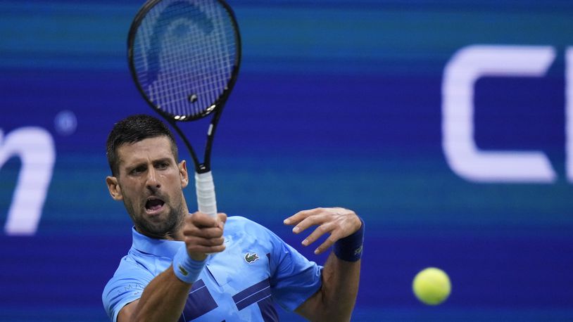 Novak Djokovic, of Serbia, returns a shot to Laslo Djere, of Serbia, during a second round match of the U.S. Open tennis championships, Wednesday, Aug. 28, 2024, in New York. (AP Photo/Frank Franklin II)