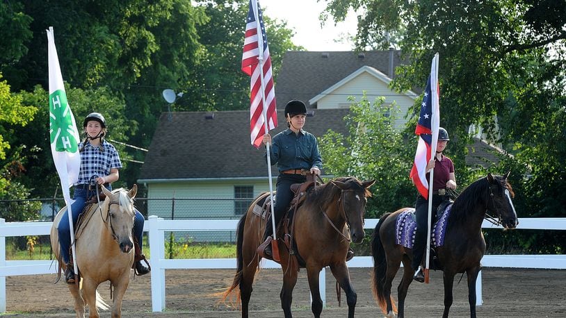 The presentation of the colors takes place before the horse show at the Greene County Fair on Tuesday, Aug. 1, 2023. MARSHALL GORBY\STAFF