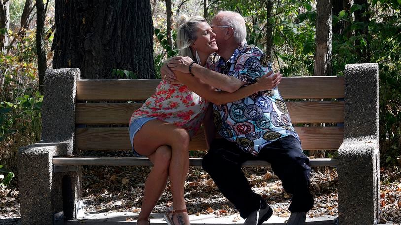 Monica Applegarth gets a hug from Jim Hatcher, Friday, Sept 20, 2024 at Charleston Falls Preserve. Applegarth donated a kidney to Hatcher and she is now training to run the NYC Marathon. MARSHALL GORBY\STAFF