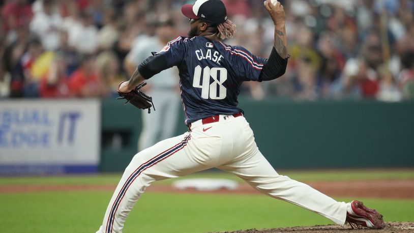 Cleveland Guardians relief pitcher Emmanuel Clase (48) pitches in the ninth inning of a baseball game against the Pittsburgh Pirates Friday, Aug. 30, 2024, in Cleveland. (AP Photo/Sue Ogrocki)