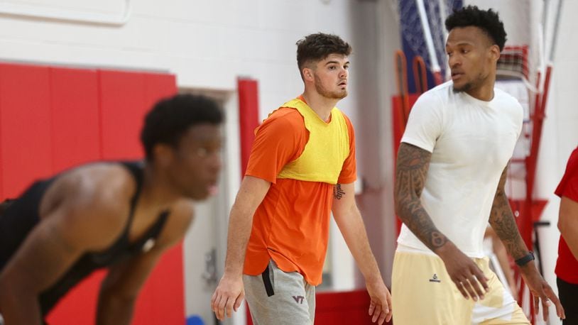 Former Wright State forward Grant Basile, center, practices with the Red Scare for The Basketball Tournament on Tuesday, July 16, 2024, at the Cronin Center in Dayton. David Jablonski/Staff