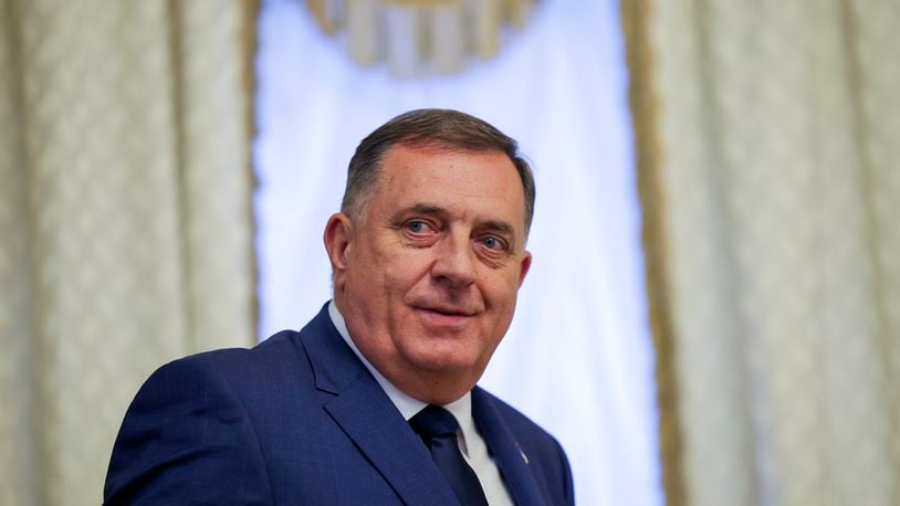 FILE - Bosnian Serb political leader Milorad Dodik stands prior his talks with Russia's President Vladimir Putin in St. Petersburg, Russia, June 6, 2024. A network of people and firms that support the sanctioned president of Bosnia's Serb-run part, Dodik, has been hit with new sanctions. Treasury's Office of Foreign Assets Control has designated two people and seven companies that provide revenue for Dodik and his family. (Anton Vaganov/Pool Photo via AP, File)