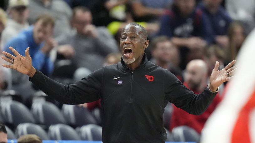 Dayton head coach Anthony Grant shouts during the first half of a second-round college basketball game against Arizona in the NCAA Tournament in Salt Lake City, Saturday, March 23, 2024. (AP Photo/Rick Bowmer)