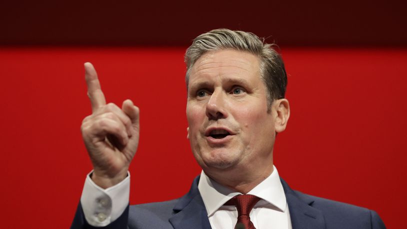 FILE - Britain's Shadow Brexit Secretary Keir Starmer speaks on stage during the Labour Party Conference at the Brighton Centre in Brighton, England, Monday, Sept. 23, 2019. (AP Photo/Kirsty Wigglesworth, File)