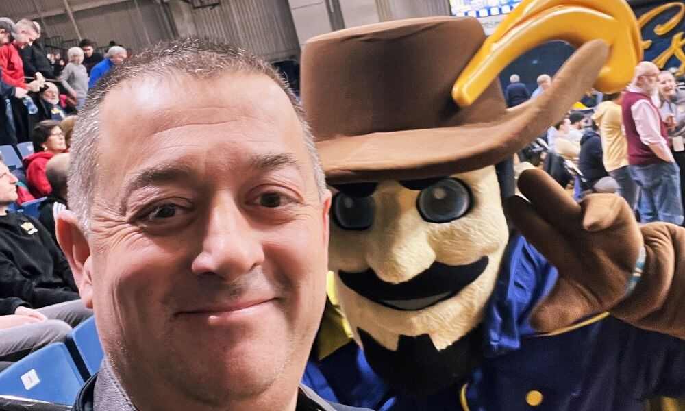 David Jablonski takes a selfie with the La Salle mascot on Jan. 23, 2024, at Tom Gola Arena in Philadelphia.