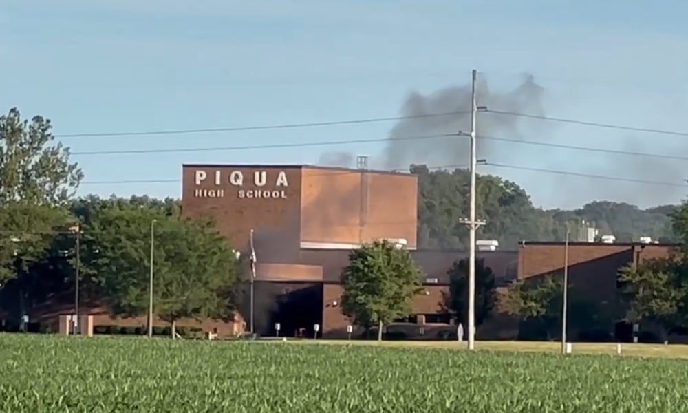 Piqua High School's entrance caught fire after an explosive device was detonated Monday, July 1, 2024. Multiple windows and doors were reportedly blown out as a result. Photo courtesy Piqua Police Department.