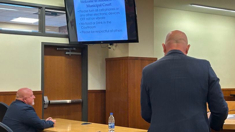 Vincent "Scott" Smith, left, was represented by attorney Christopher Deal Wednesday morning in Middletown Municipal Court. The felony charges against Smith were bound over to a Butler County grand jury. RICK McCRABB/STAFF