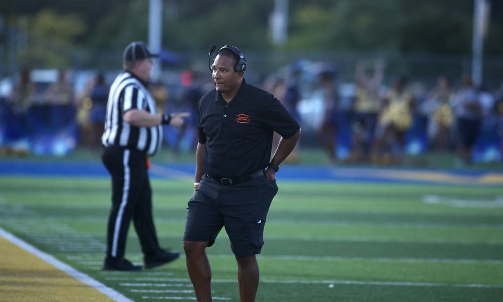 Beavercreek's Marcus Colvin coaches during a game against Beavercreek on Friday, Sept. 15, 2023, in Springfield. David Jablonski/Staff