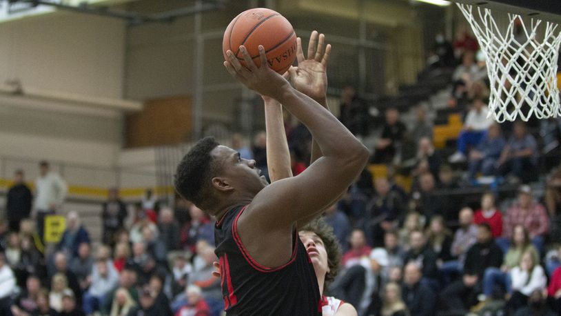 Wayne's Aamil Wagner puts up a shot against Franklin in a Division I sectional final at Centerville. Jeff Gilbert/CONTRIBUTED