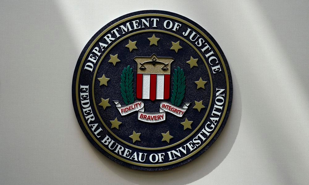 FILE - An FBI seal is seen on a wall on Aug. 10, 2022, in Omaha, Neb. (AP Photo/Charlie Neibergall, File)