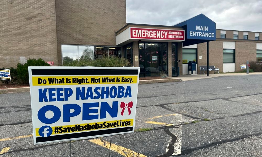 A sign pushing to keep the hospital open stands outside Nashoba Valley Medical Center in Ayer, Mass., Tuesday, Aug. 20, 2024. (AP Photo/Nick Perry)